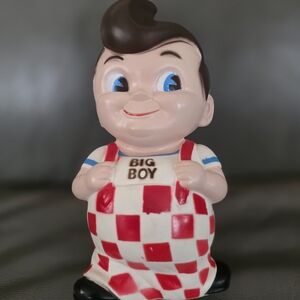 Checkered Red and White Toy Figure